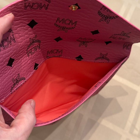 MCM Pink Logo Clutch Wristlet
EUC no callouts - Picture 4 of 10